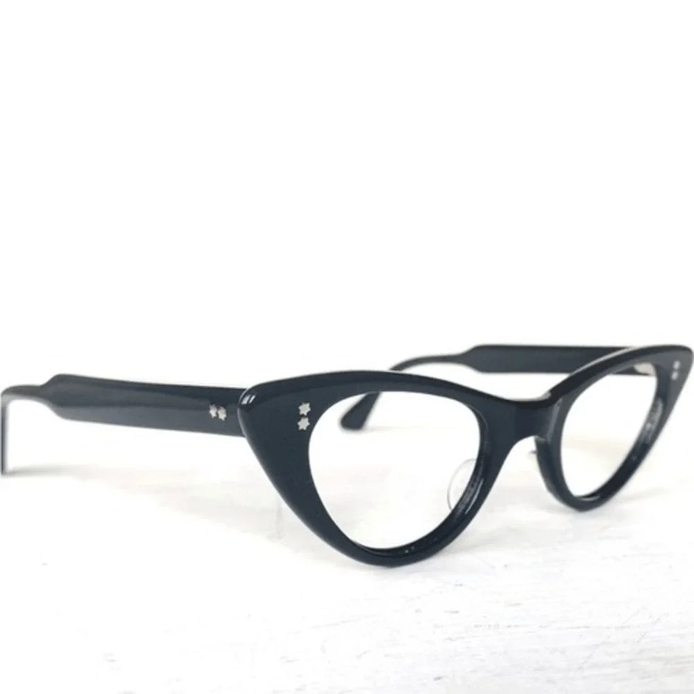 Vintage cat frame glasses by France Swank. Mint condition.